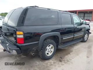 2004 Chevrolet Suburban LT z VIN 1GNFK16ZX4J291419, wystawiony jako IAAI lot #42163331 z przebiegiem 235 054 mil mil oraz . Historia ofert i sprzedaży dostępna na DreamBid. Obrazek 4.