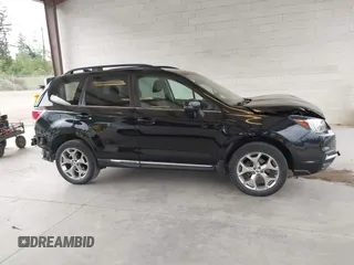 2018 Subaru Forester Touring with VIN JF2SJAWC2JH598982, listed as a IAAI auction lot 42455652 with 57,254 mi miles and . Bid and sale history available at DreamBid. Image 14.
