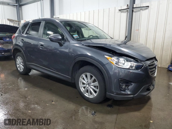 2016 Mazda CX-5 Touring z VIN JM3KE4CY5G0852073, wystawiony jako Copart lot #56599055 z przebiegiem 72 167 mil mil oraz Szkoda całkowita • Salvage title. Historia ofert i sprzedaży dostępna na DreamBid. Obrazek 4.
