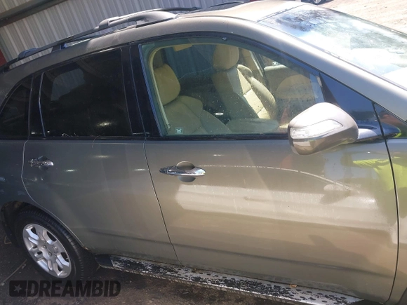 2007 Acura MDX Technology with VIN 2HNYD28477H553707, listed as a IAAI auction lot 41872810 with 148,554 mi miles and . Bid and sale history available at DreamBid. Image 13.