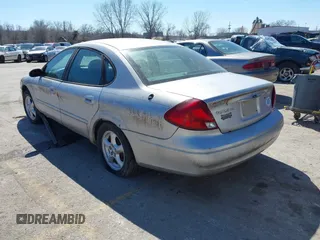 2003 Ford Taurus SE Standard with VIN 1FAFP53U53G226439, listed as a IAAI auction lot 41845541 with 215,870 mi miles. Bid and sale history available at carsss.com. Image 3.