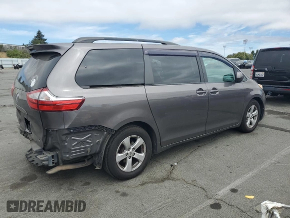 2015 Toyota Sienna LE AAS with VIN 5TDKK3DC1FS577795, listed as a Copart auction lot 66215355 with 197,902 mi miles and Salvage title. Bid and sale history available at DreamBid. Image 3.