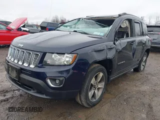 2016 Jeep Compass High Altitude Edition with VIN 1C4NJDEB0GD696124, listed as a IAAI auction lot 41973334 with 67,056 mi miles. Bid and sale history available at carsss.com. Image 2.