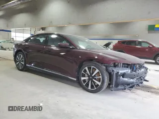 2023 Lucid Air Pure with VIN 50EA1PFA0PA006262, listed as a Copart auction lot 48882515 with 32,942 mi miles and Salvage Title. Bid and sale history available at carsss.com. Image 4.
