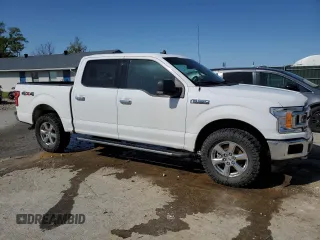2019 Ford F-150 XL with VIN 1FTEW1E57KKE02961, listed as a Copart auction lot 52257105 with 117,296 mi miles and Salvage Title. Bid and sale history available at carsss.com. Image 4.
