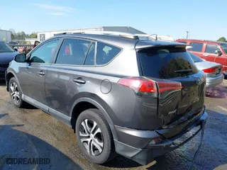 2016 Toyota RAV4 LE with VIN 2T3ZFREV7GW305998, listed as a IAAI auction lot 41869024 with 163,463 mi miles. Bid and sale history available at carsss.com. Image 3.