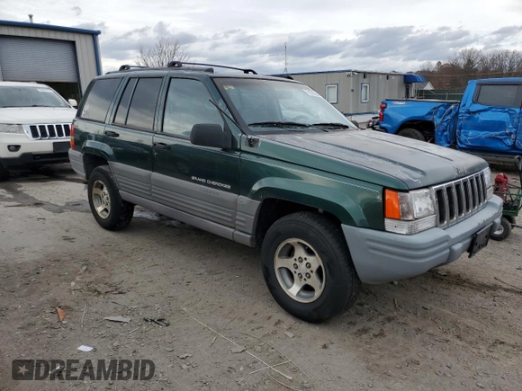 1998 Jeep Grand Cherokee Laredo with VIN 1J4GZ58S3WC152962, listed as a Copart auction lot 79333864 with 0 mi miles and Clean Title. Bid and sale history available at carsss.com. Image 4.