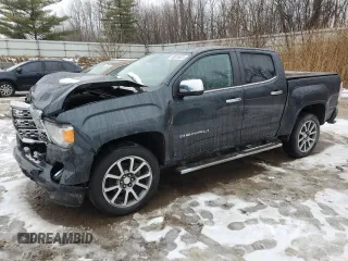 2021 GMC Canyon 4WD Denali with VIN 1GTG6EENXM1199427, listed as a Copart auction lot 86018624 with 98,520 mi miles and Salvage Title. Bid and sale history available at carsss.com. Image 1.