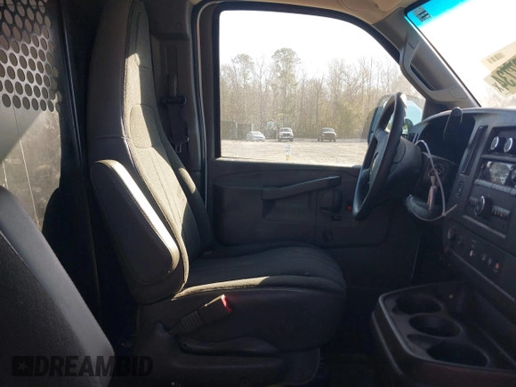 2021 Chevrolet Express Cargo with VIN 1GCWGAF7XM1205308, listed as a IAAI auction lot 41829936 with 64,548 mi miles and . Bid and sale history available at DreamBid. Image 5.