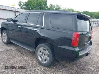 2017 Chevrolet Tahoe LT with VIN 1GNSCBKCXHR342170, listed as a IAAI auction lot 42137766 with 76,854 mi miles and . Bid and sale history available at DreamBid. Image 3.