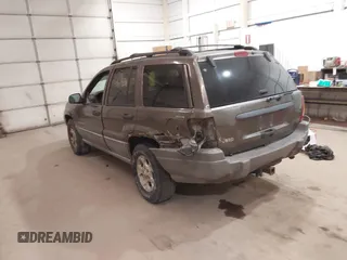 2000 Jeep Grand Cherokee Laredo z VIN 1J4GW48S1YC277710, wystawiony jako IAAI lot #42033564 z przebiegiem Nie podano mil oraz . Historia ofert i sprzedaży dostępna na DreamBid. Obrazek 3.