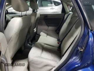 2009 Ford Focus SE with VIN 1FAHP35N69W229657, listed as a Copart auction lot 49583665 with 132,459 mi miles and Salvage Title. Bid and sale history available at carsss.com. Image 10.