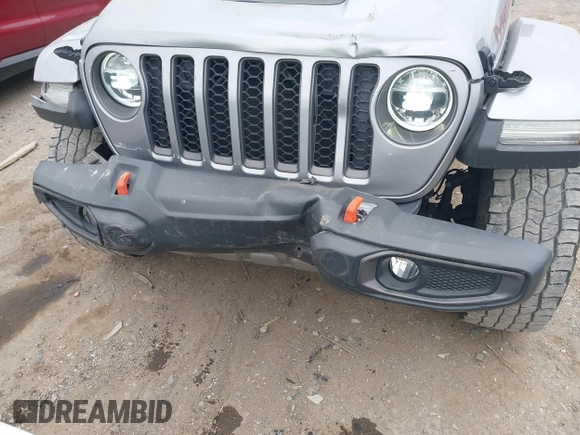 2021 Jeep Gladiator Mojave with VIN 1C6JJTEG9ML519309, listed as a IAAI auction lot 41701544 with 64,461 mi miles and . Bid and sale history available at DreamBid. Image 6.