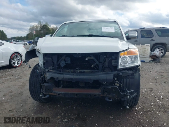 2015 Nissan Armada Platinum z VIN 5N1BA0NF9FN606276, wystawiony jako IAAI lot #41865375 z przebiegiem 223 761 mil mil oraz . Historia ofert i sprzedaży dostępna na DreamBid. Obrazek 13.