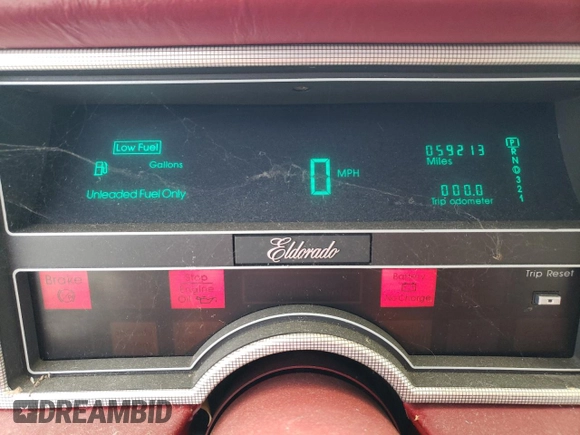 1986 Cadillac Eldorado z VIN 1G6EL5784GU616263, wystawiony jako Copart lot #48741325 z przebiegiem 59 213 mil mil oraz Tytuł czysty. Historia ofert i sprzedaży dostępna na DreamBid. Obrazek 9.