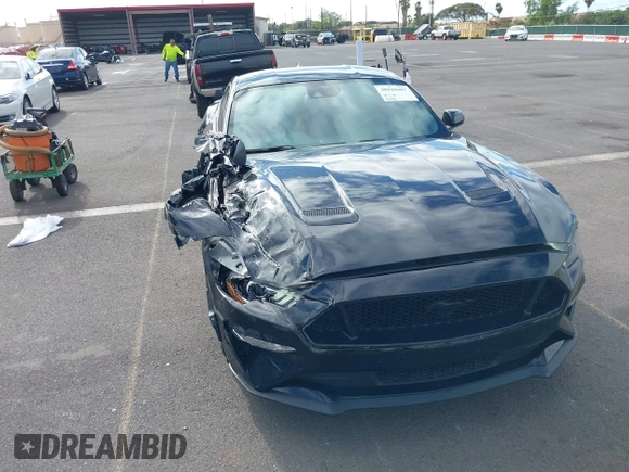 2021 Ford Mustang GT z VIN 1FA6P8CF1M5147740, wystawiony jako IAAI lot #38920487 z przebiegiem 15 299 mil mil oraz . Historia ofert i sprzedaży dostępna na DreamBid. Obrazek 20.