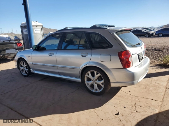 2003 Mazda Protege5 with VIN JM1BJ245231207690, listed as a Copart auction lot 79297224 with 225,762 mi miles and Salvage Title. Bid and sale history available at carsss.com. Image 2.