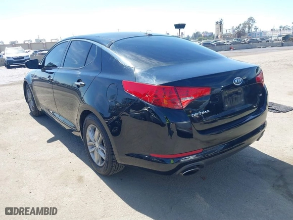 2012 Kia Optima LX with VIN 5XXGM4A71CG082636, listed as a IAAI auction lot 41862116 with 141,753 mi miles. Bid and sale history available at carsss.com. Image 3.