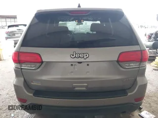 2018 Jeep Grand Cherokee Laredo E with VIN 1C4RJEAG1JC275356, listed as a IAAI auction lot 42150422 with 69,720 mi miles and . Bid and sale history available at DreamBid. Image 16.