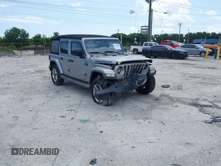 2018 Jeep Wrangler Unlimited Sahara z VIN 1C4HJXEG9JW244419, wystawiony jako IAAI lot #42102009 z przebiegiem 59 557 mil mil oraz . Historia ofert i sprzedaży dostępna na DreamBid. Obrazek 1.