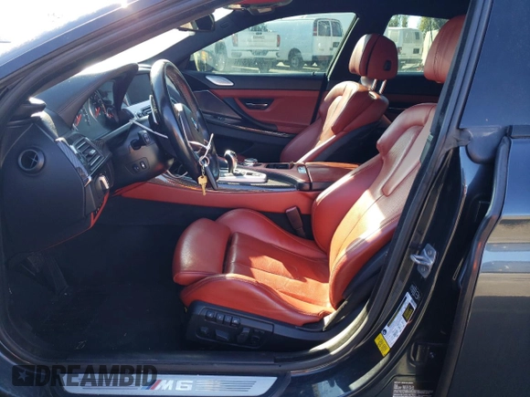 2015 BMW M6 z VIN WBS6C9C5XFD467854, wystawiony jako Copart lot #78871744 z przebiegiem 55 789 mil mil oraz Szkody całkowita. Historia ofert i sprzedaży dostępna na DreamBid. Obrazek 7.