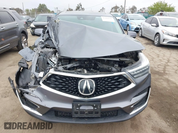2019 Acura RDX with VIN 5J8TC1H39KL000073, listed as a IAAI auction lot 42184792 with 55,524 mi miles and . Bid and sale history available at DreamBid. Image 12.