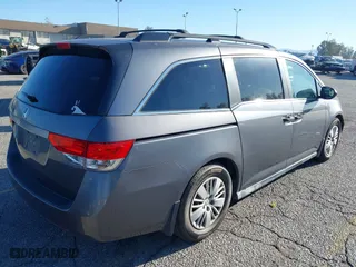 2014 Honda Odyssey LX with VIN 5FNRL5H23EB015067, listed as a IAAI auction lot 41760301 with 167,389 mi miles. Bid and sale history available at carsss.com. Image 4.