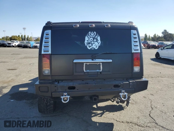 2003 Hummer H2 with VIN 5GRGN23U83H134284, listed as a Copart auction lot 70259154 with 0 mi miles and Salvage Title. Bid and sale history available at carsss.com. Image 6.
