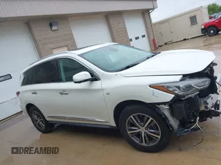 2019 Infiniti QX60 Luxe z VIN 5N1DL0MM6KC506158, wystawiony jako IAAI lot #42316181 z przebiegiem 81 211 mil mil oraz . Historia ofert i sprzedaży dostępna na DreamBid. Obrazek 14.
