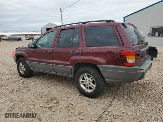 2002 Jeep Grand Cherokee Laredo with VIN 1J4GW48S12C321096, listed as a Copart auction lot 54009435 with 270,713 mi miles and Clean Title. Bid and sale history available at carsss.com. Image 2.