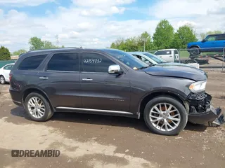 2014 Dodge Durango Citadel with VIN 1C4RDJEG7EC493379, listed as a IAAI auction lot 42159732 with 184,373 mi miles and . Bid and sale history available at DreamBid. Image 13.