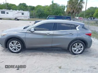 2018 Infiniti QX30 Premium z VIN SJKCH5CPXJA003377, wystawiony jako IAAI lot #41876556 z przebiegiem 91 673 mil mil oraz . Historia ofert i sprzedaży dostępna na DreamBid. Obrazek 14.
