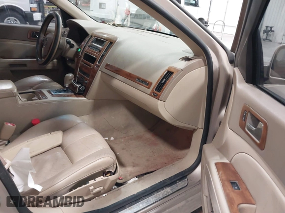2005 Cadillac STS with VIN 1G6DC67A550224742, listed as a IAAI auction lot 41448030 with 152,149 mi miles. Bid and sale history available at carsss.com. Image 5.
