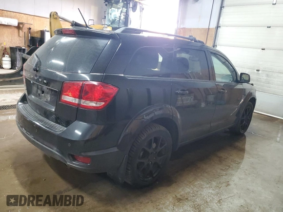 2013 Dodge Journey Crew with VIN 3C4PDCCG4DT693869, listed as a Copart auction lot 63666684 with 134,424 mi miles and Salvage title. Bid and sale history available at DreamBid. Image 3.