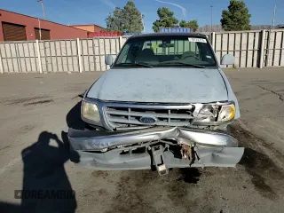 2000 Ford F-150 XL with VIN 1FTZX0723YKA02769, listed as a Copart auction lot 78722714 with 354,312 mi miles and Salvage title. Bid and sale history available at DreamBid. Image 11.