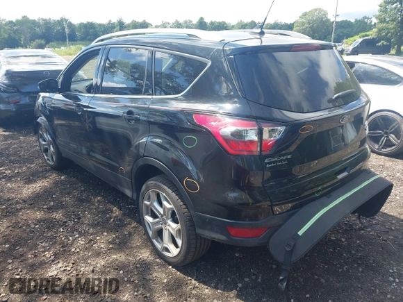 2018 Ford Escape Titanium with VIN 1FMCU9J94JUC98805, listed as a IAAI auction lot 42718214 with 36,689 mi miles and . Bid and sale history available at DreamBid. Image 3.