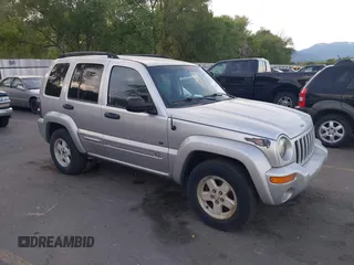 2003 Jeep Liberty Limited z VIN 1J4GL58KX3W657800, wystawiony jako IAAI lot #42464782 z przebiegiem 244 363 mil mil oraz . Historia ofert i sprzedaży dostępna na DreamBid. Obrazek 1.