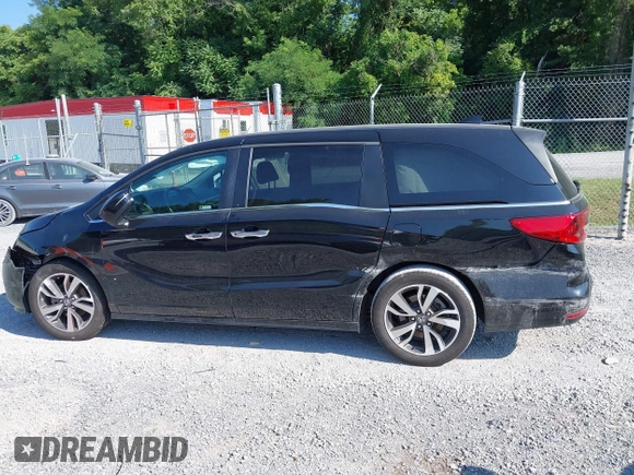 2021 Honda Odyssey Touring with VIN 5FNRL6H84MB027396, listed as a IAAI auction lot 42616650 with 67,207 mi miles and . Bid and sale history available at DreamBid. Image 14.