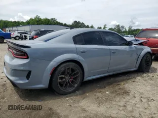 2021 Dodge Charger SRT Hellcat Widebody z VIN 2C3CDXL97MH603070, wystawiony jako Copart lot #57661925 z przebiegiem Nie podano mil oraz Szkoda całkowita • Salvage title. Historia ofert i sprzedaży dostępna na DreamBid. Obrazek 3.
