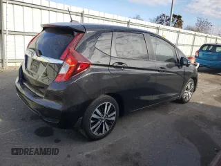 2018 Honda Fit EX-L with VIN 3HGGK5H93JM712611, listed as a Copart auction lot 76383484 with 125,072 mi miles and Salvage Title. Bid and sale history available at carsss.com. Image 3.