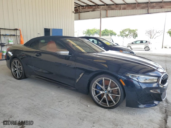2019 BMW 8 Series M850i xDrive with VIN WBAFY4C59KBX38790, listed as a Copart auction lot 69656654 with 30,863 mi miles and Salvage Title. Bid and sale history available at carsss.com. Image 4.