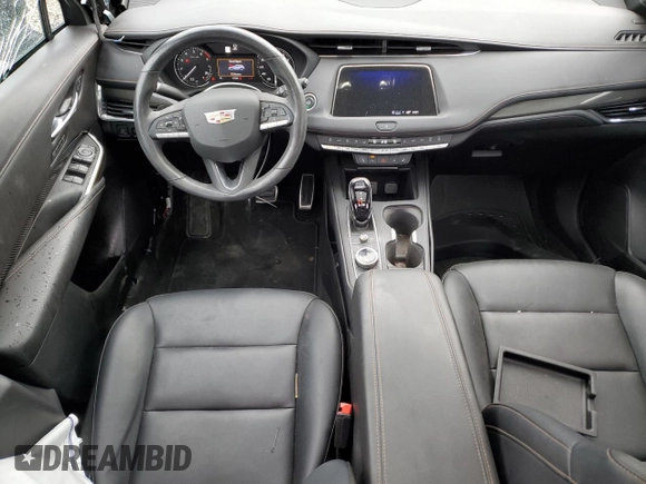 2023 Cadillac XT4 FWD Sport with VIN 1GYFZER48PF155576, listed as a Copart auction lot 77071994 with 47,539 mi miles and Salvage title. Bid and sale history available at DreamBid. Image 8.