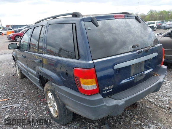 2003 Jeep Grand Cherokee Laredo with VIN 1J4GW48S63C591605, listed as a IAAI auction lot 41973681 with 177,024 mi miles and . Bid and sale history available at DreamBid. Image 3.