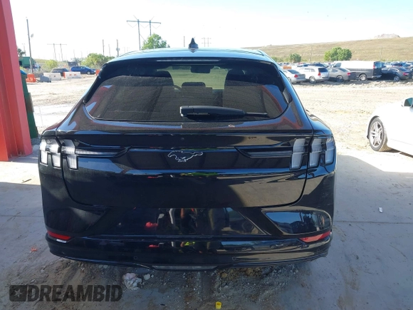 2023 Ford Mustang Mach-E Premium z VIN 3FMTK3R49PMA72364, wystawiony jako IAAI lot #41999783 z przebiegiem 15 023 mil mil oraz . Historia ofert i sprzedaży dostępna na DreamBid. Obrazek 16.