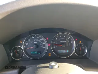 2006 Jeep Commander with VIN 1J8HG48K56C293759, listed as a Copart auction lot 86231064 with 173,203 mi miles and Salvage Title. Bid and sale history available at carsss.com. Image 9.