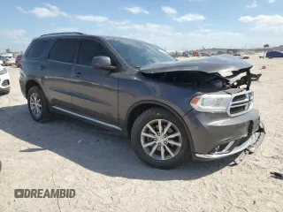 2018 Dodge Durango SXT with VIN 1C4RDJAG0JC329682, listed as a Copart auction lot 49541005 with 102,596 mi miles and Salvage Title. Bid and sale history available at DreamBid. Image 4.