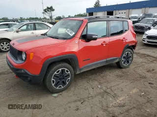 2015 Jeep Renegade Trailhawk z VIN ZACCJBCT5FPB27437, wystawiony jako Copart lot #64031865 z przebiegiem 106 479 mil mil oraz Czysty tytuł • Clean title. Historia ofert i sprzedaży dostępna na DreamBid. Obrazek 1.