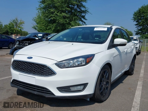2016 Ford Focus SE with VIN 1FADP3F20GL329898, listed as a IAAI auction lot 42844995 with 20,485 mi miles and . Bid and sale history available at DreamBid. Image 2.