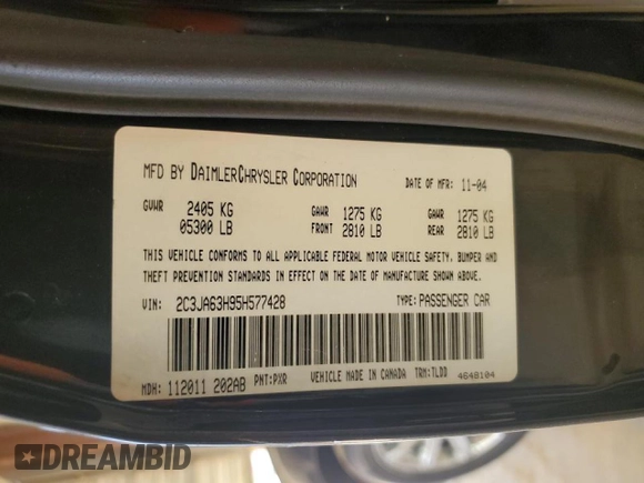 2005 Chrysler 300 C z VIN 2C3JA63H95H577428, wystawiony jako Copart lot #50975795 z przebiegiem 130 630 mil mil oraz Szkoda całkowita • Salvage title. Historia ofert i sprzedaży dostępna na DreamBid. Obrazek 14.