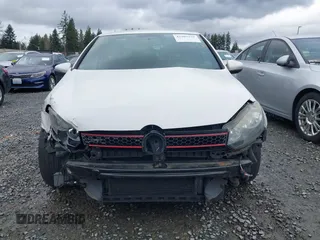 2010 Volkswagen GTI z VIN WVWFD7AJ3AW313279, wystawiony jako IAAI lot #41902259 z przebiegiem 91 594 mil mil oraz . Historia ofert i sprzedaży dostępna na DreamBid. Obrazek 13.